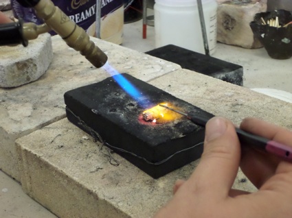 Soldering the wires together.