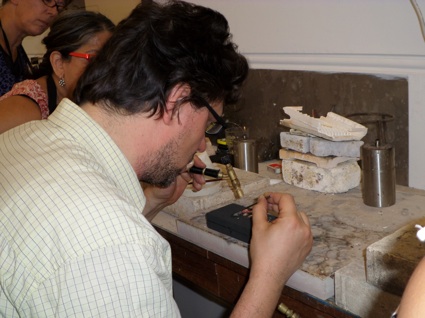 Stefano soldering the tiny precious metal mosaics.