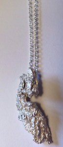 Pendant. 2014.  Cast sandalwood bark, sterling silver. 